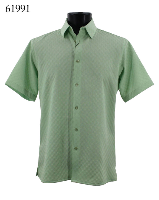 The Bassiri Short Sleeve Shirt 61991 by Bassiri is showcased on a black display stand, highlighting its regular fit design in green with a textured pattern.