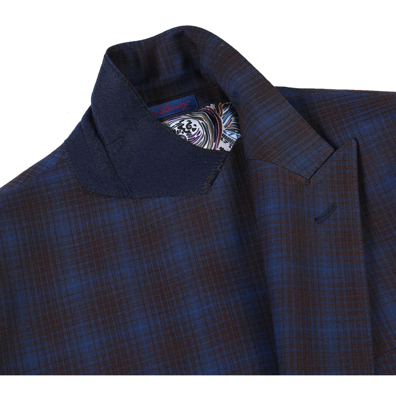 Displayed on a mannequin is the ENGLISH LAUNDRY Navy with Burgundy Check Suit 82-55-470EL from English Laundry, featuring a slim fit and peak lapels. It is stylishly complemented by a white dress shirt and a purple polka dot tie.