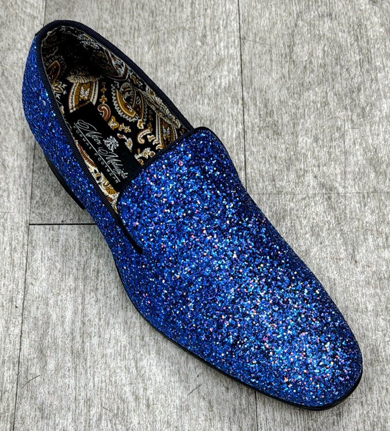 The Exclusive Formal Dress Shoe Blue BARNES by UNIQUE DESIGN MENSWEAR, made with genuine leather and a paisley-patterned interior, rests elegantly on a wooden floor.