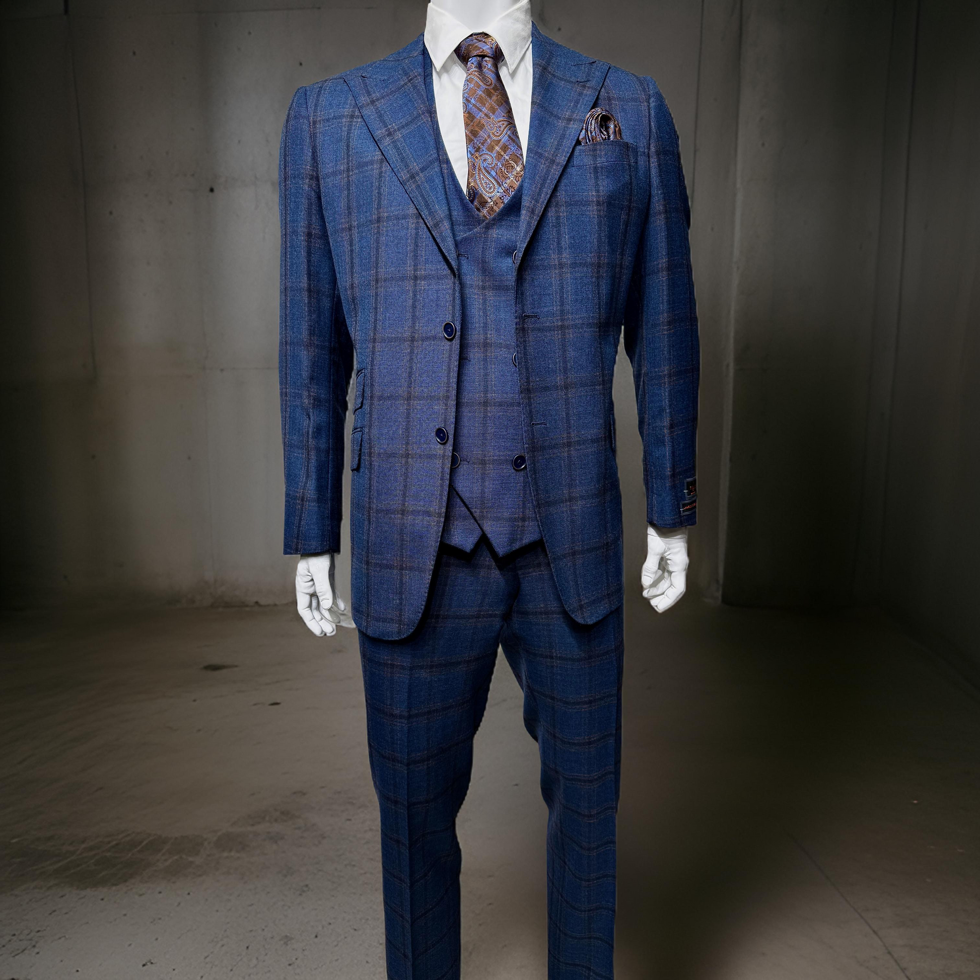 Mannequin showcasing the Unique Design Menswear's Tiglio Luxe Prosecco Suit/Vest in a striking Blue/Rust Plaid pattern (model TL8101), elegantly complemented with a patterned tie and pocket square, set against a plain grey background.