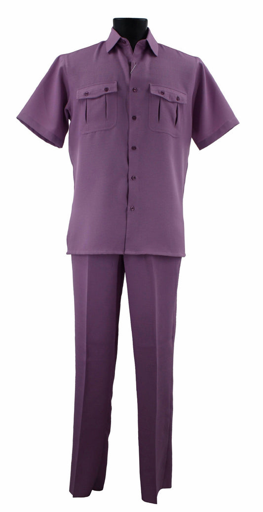 A Bassiri Lilac 2pc Set, consisting of a short-sleeved shirt and matching pants crafted from quality polyester, is displayed on a mannequin against a plain white background. Style # A 138 exudes simplicity and elegance.