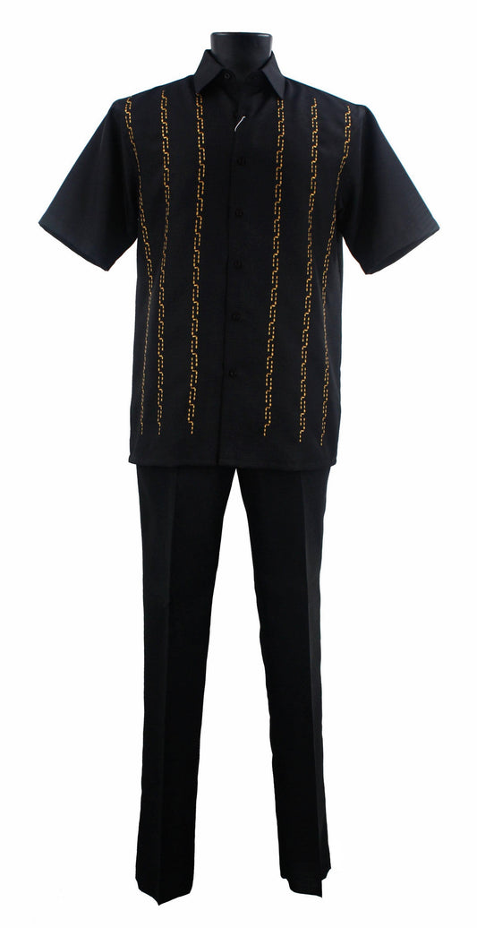 The Bassiri Black 2pc Set A 139, featuring vertical yellow embroidery, is displayed on a mannequin. Crafted from smooth polyester, this ensemble by Bassiri combines elegance and comfort effortlessly.