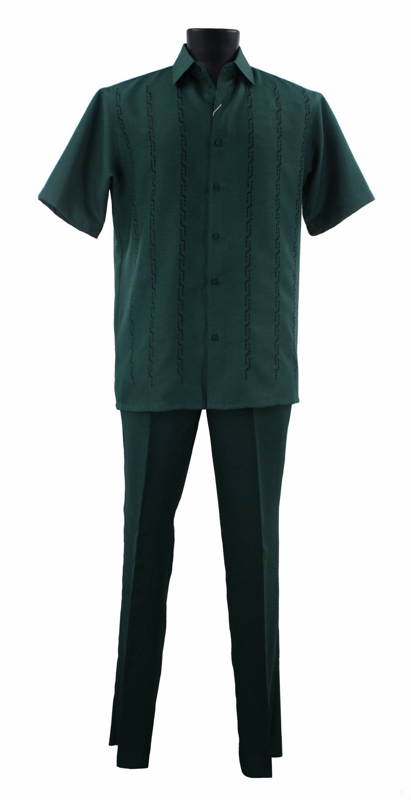 The Bassiri Emerald Green 2pc Set A 139 features a dark green guayabera shirt with vertical embroidery, crafted from polyester, paired with matching pants. Displayed on a black mannequin, this outfit showcases the elegance of the Bassiri brand.