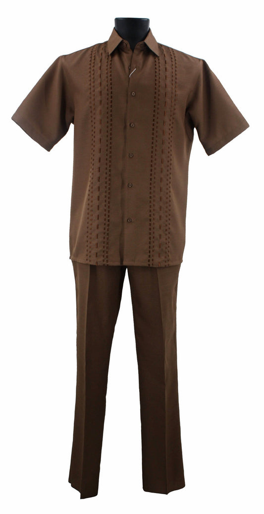 The Bassiri Toast 2pc Set A 140 features a brown short-sleeve button-up shirt with decorative stitching, crafted from polyester, and complemented by matching brown pants. The ensemble is elegantly showcased on a black mannequin.