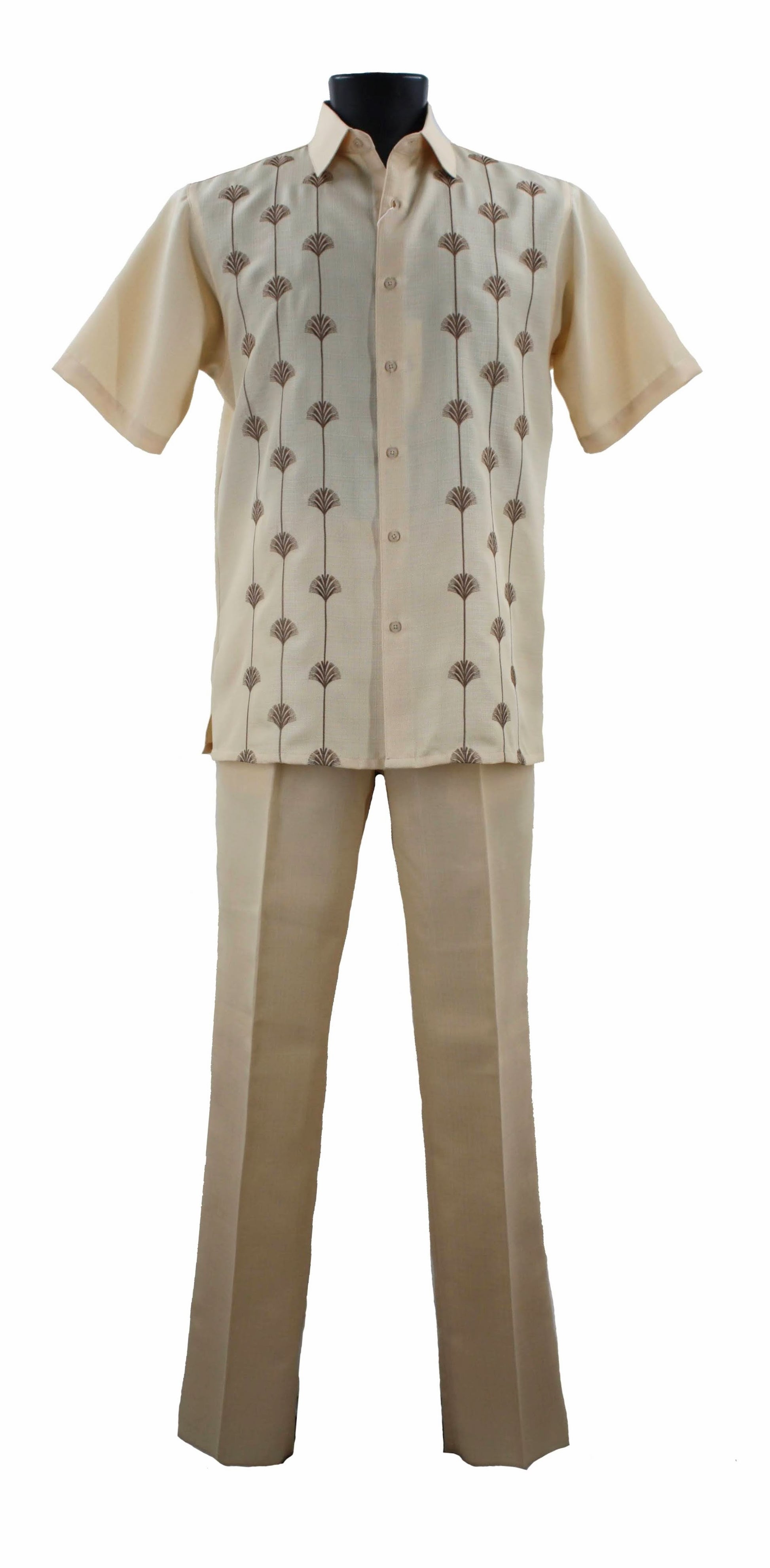 The Bassiri Banana 2pc Set A 141, from the renowned brand Bassiri, is a beige ensemble comprising a matching shirt and pants, made from 100% polyester for a soft touch. The set features exquisite embroidered details on the shirt, epitomizing effortless sophistication.