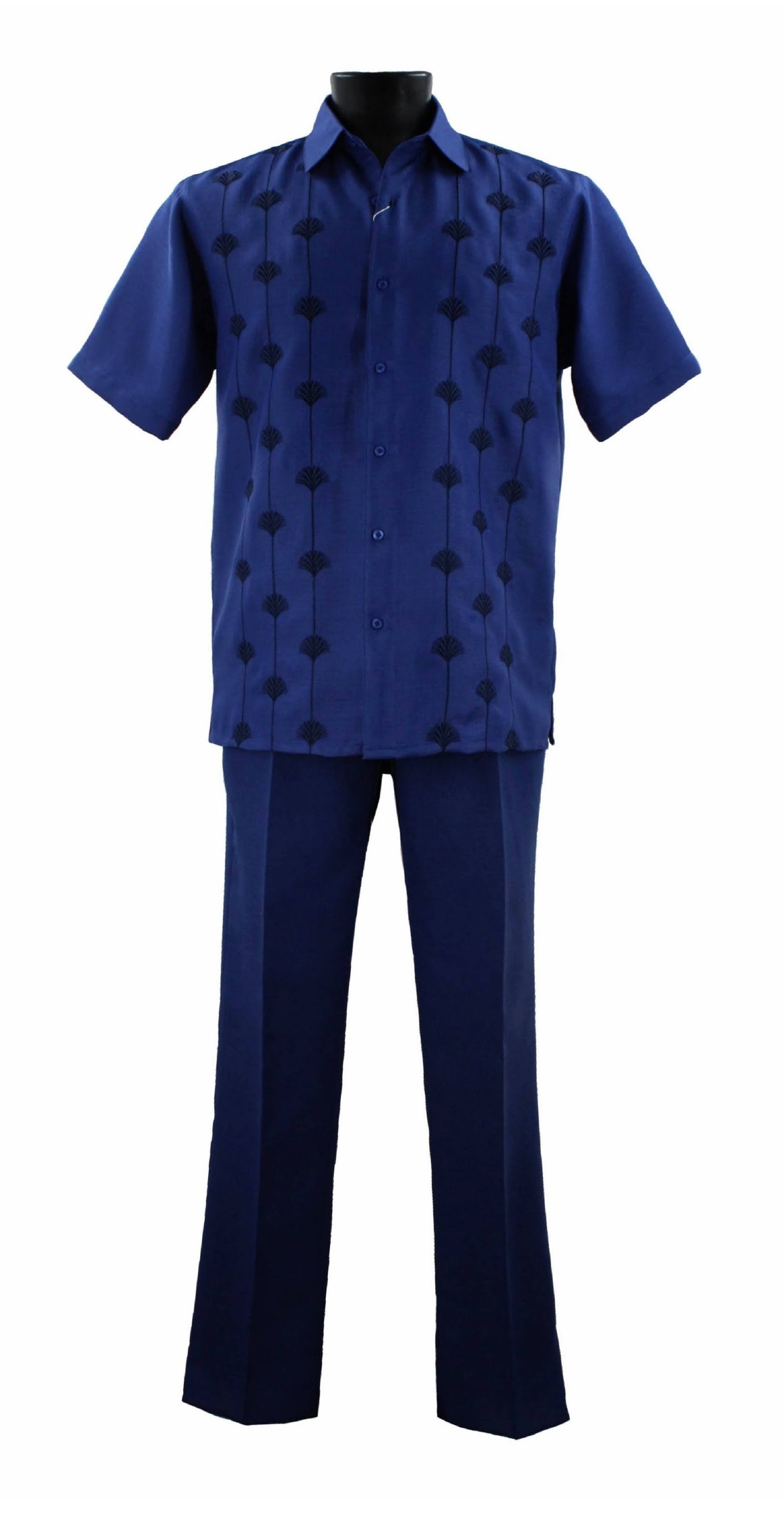 A Bassiri mannequin exhibits the Royal Blue 2pc Set A 141, presenting a navy blue short-sleeved shirt adorned with embroidered patterns, seamlessly coordinated with matching navy blue trousers. Made from premium polyester, this ensemble embodies elegance and comfort.