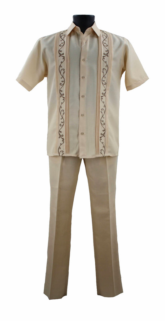 The mannequin is dressed in the Bassiri Banana 2pc Set A 142, featuring a beige embroidered polyester guayabera shirt with short sleeves paired with matching trousers.