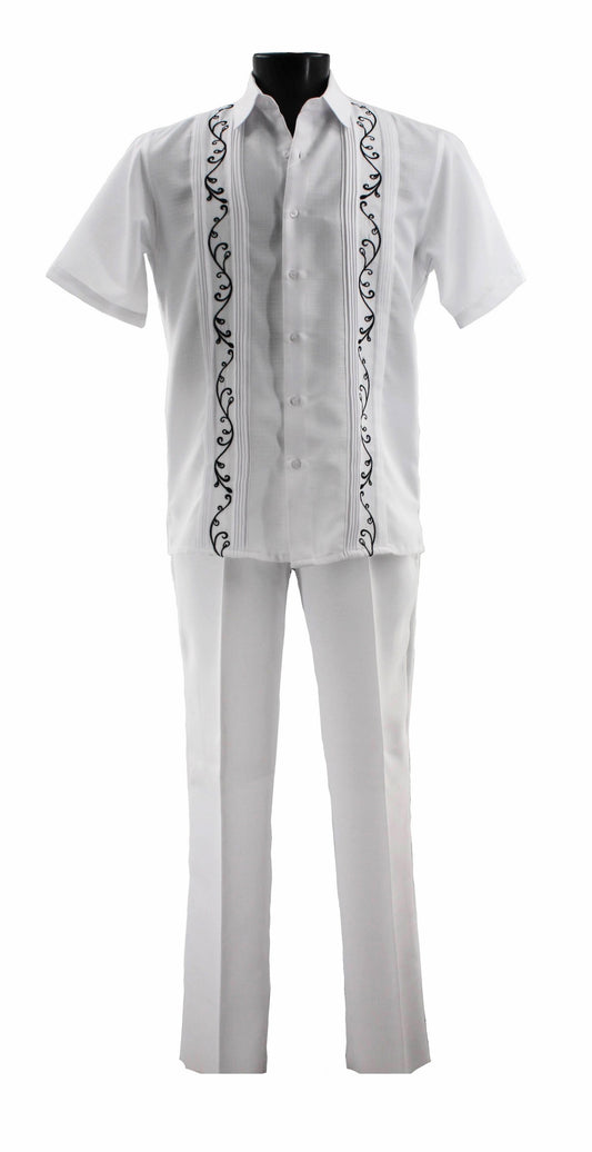 The Bassiri White 2pc Set A 142, a stylish ensemble by Bassiri, features a white short-sleeve guayabera shirt with black embroidery crafted from 100% polyester, paired with matching white pants. This distinctive set is elegantly showcased against a plain background.