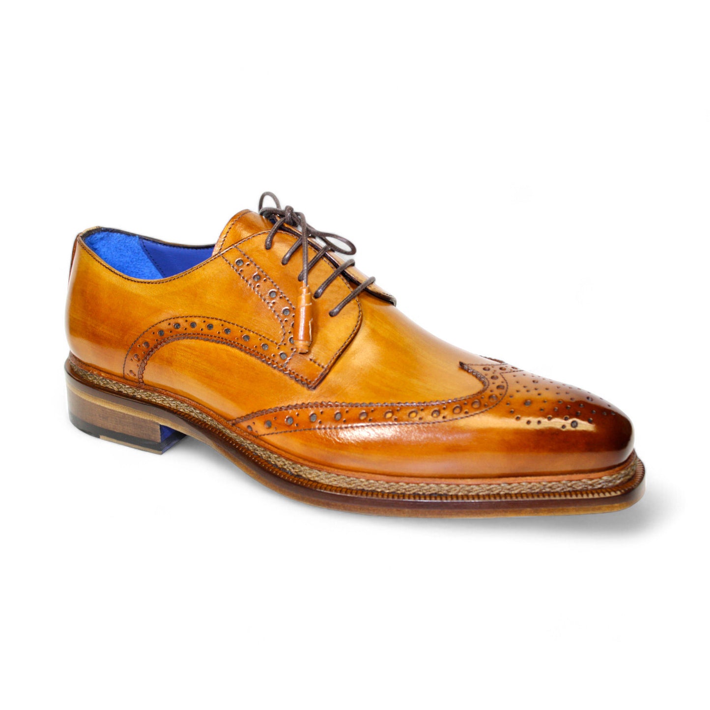 The Emilio Franco "Adriano" Cognac Shoes, meticulously crafted by Emilio Franco Artigiana in Italy, showcase a polished brown leather brogue design with intricate detailing, a blue inner lining, and matching brown laces.