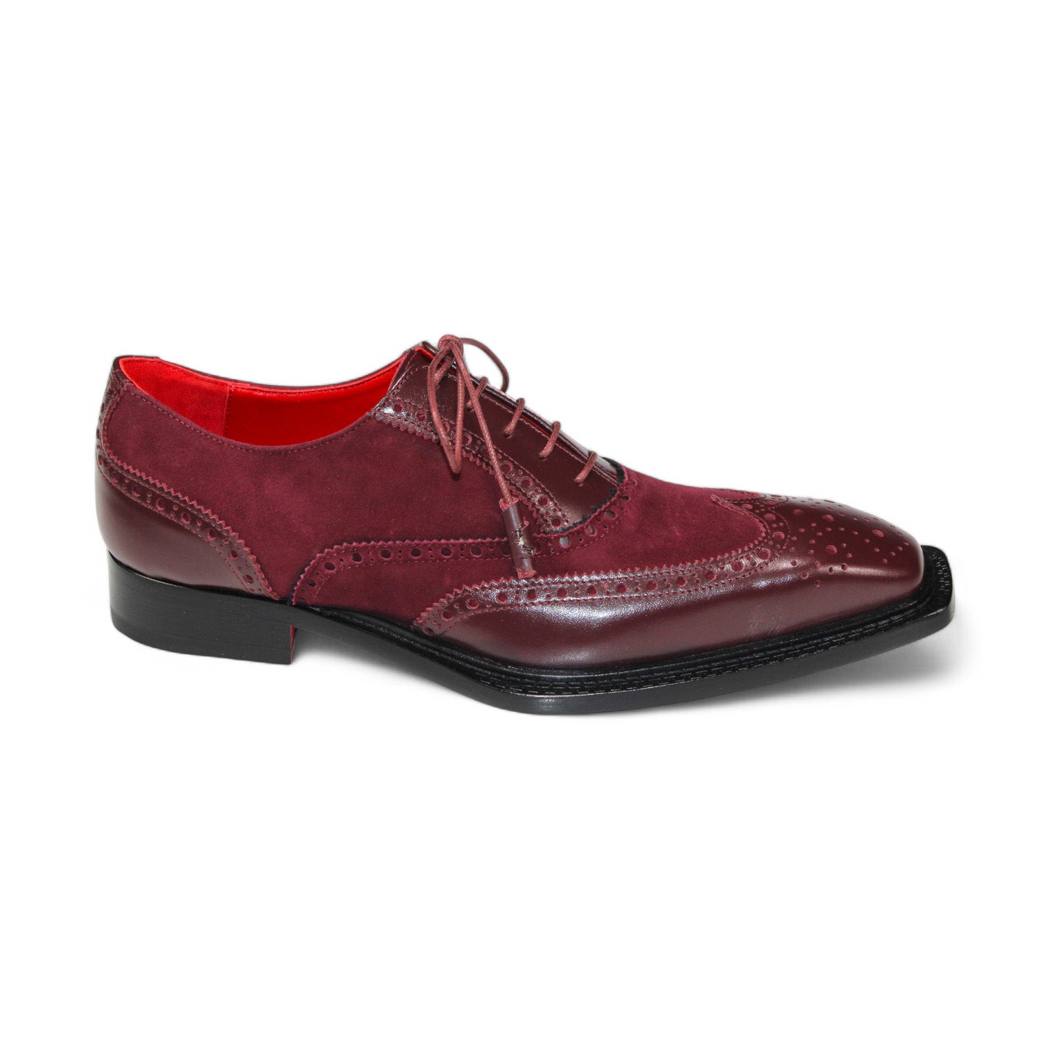 Introducing the Emilio Franco "Antonio" Burgundy Shoes, meticulously crafted in Italy. These shoes showcase brogue detailing with a luxurious combination of suede and leather uppers, complemented by a black sole and striking red interior lining.