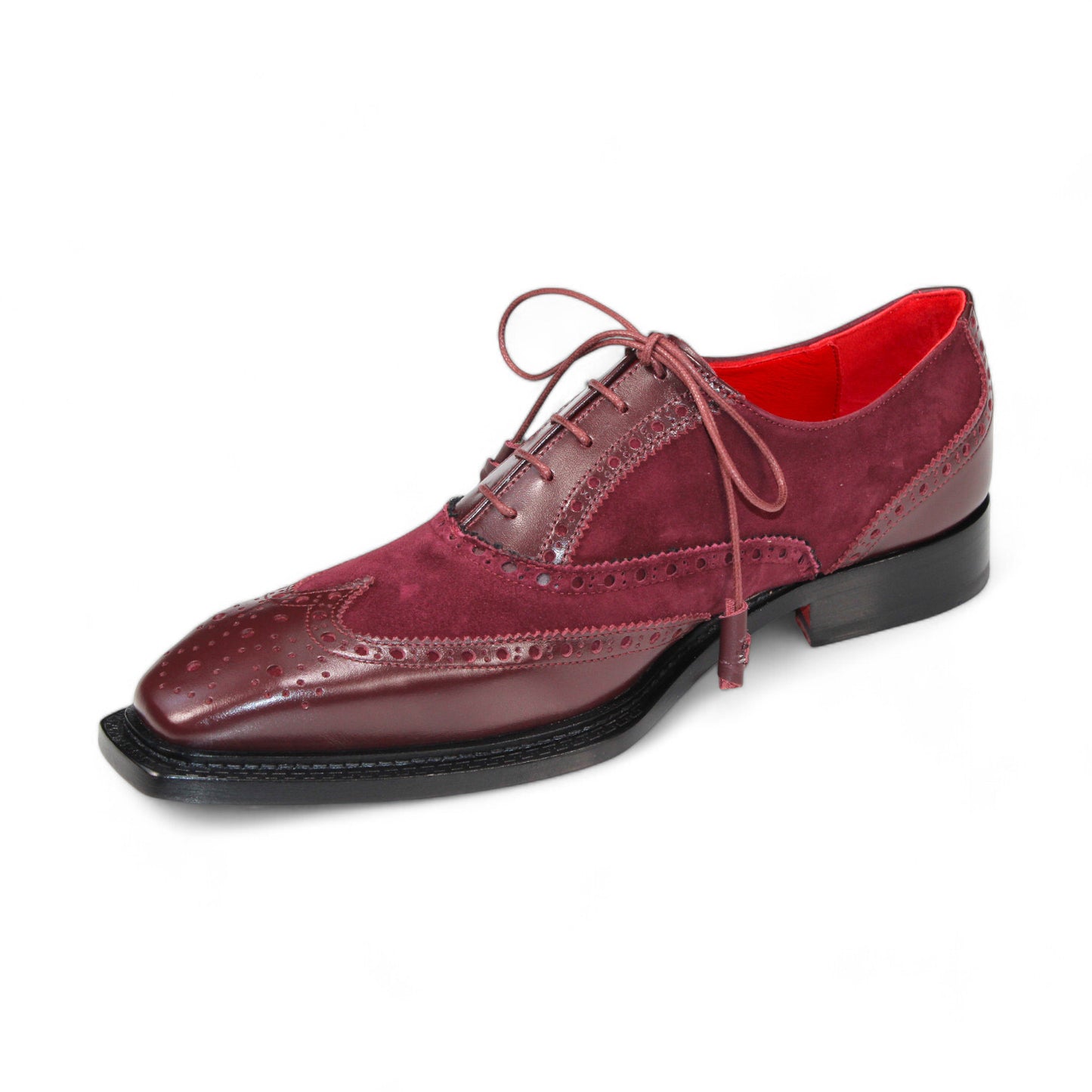 Introducing the Emilio Franco "Antonio" Burgundy Shoes, meticulously crafted in Italy. These shoes showcase brogue detailing with a luxurious combination of suede and leather uppers, complemented by a black sole and striking red interior lining.