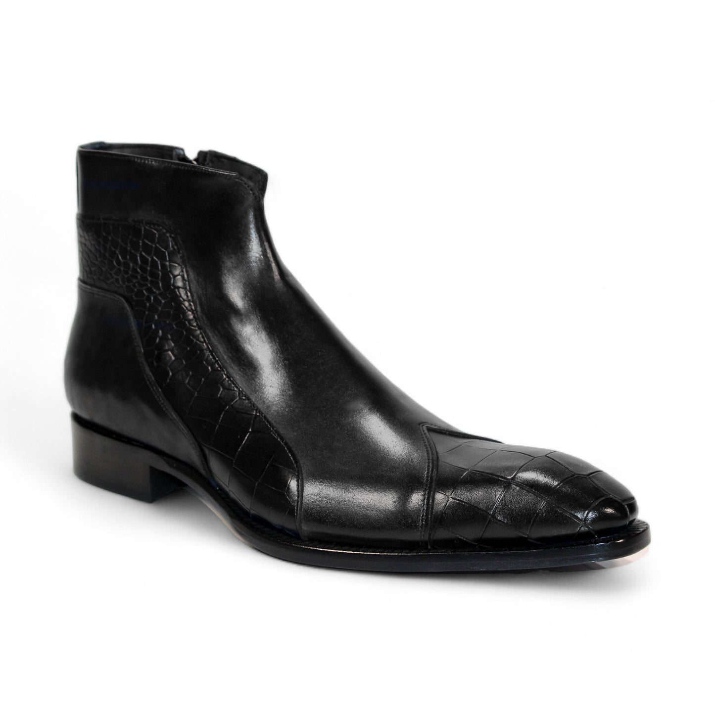 The Duca Di Matiste Aprilia (Black) ankle boot is skillfully crafted from genuine leather, showcasing a distinctive embossed Croco design on the toe and side. With its sleek finish and low heel, this Italian-made footwear embodies elegance.