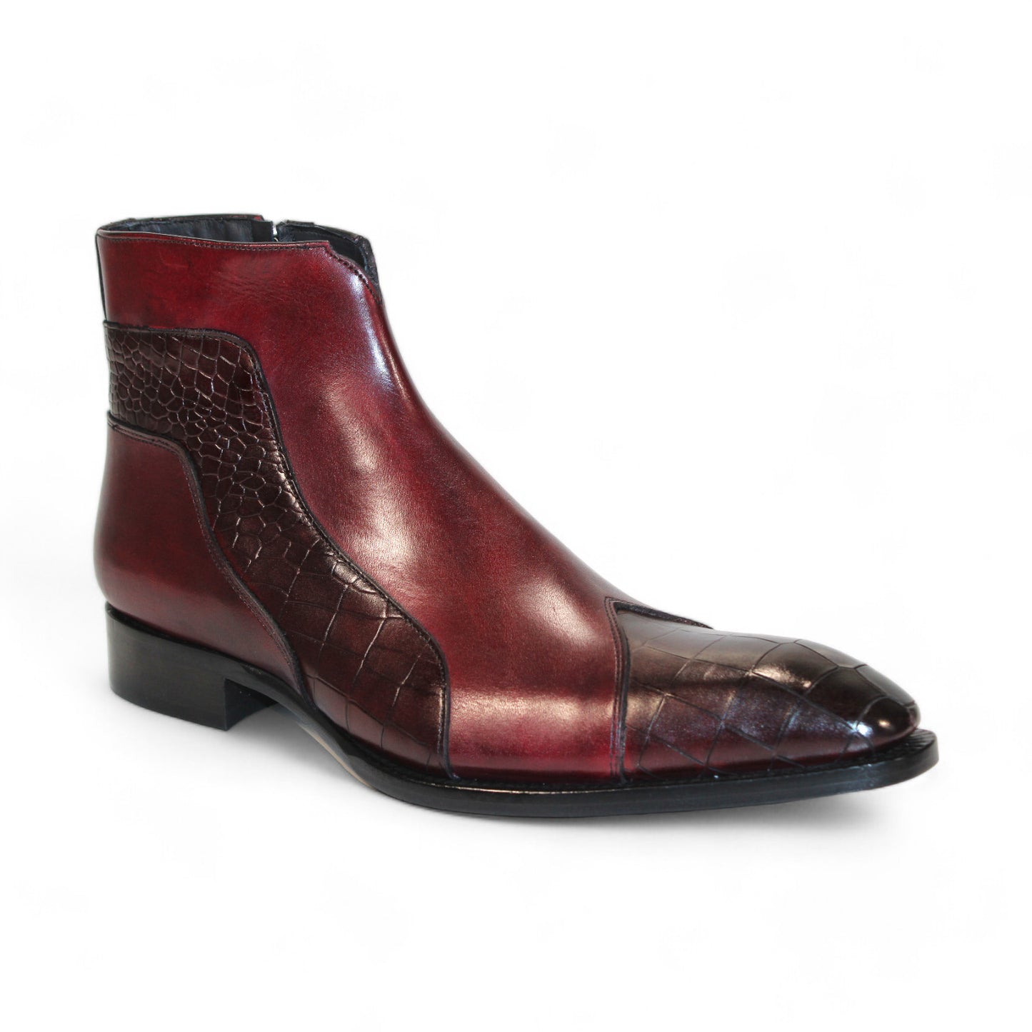 Displayed strikingly against a white background, the Duca Di Matiste Aprilia ankle boot in Burgundy/Antique Red features a luxurious Italian leather design with embossed croco pattern accents and a tasteful low heel.