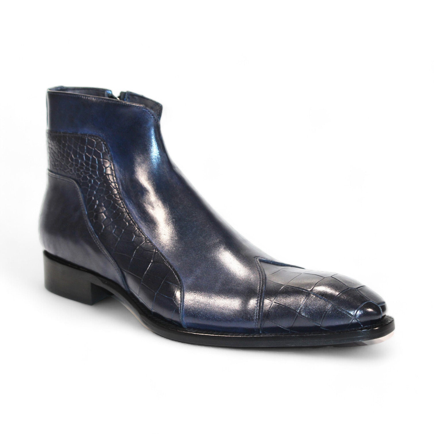 The Duca Di Matiste Aprilia (Navy), made in Italy, is a blue leather ankle boot featuring a striking crocodile pattern and square toe on a pristine white background.