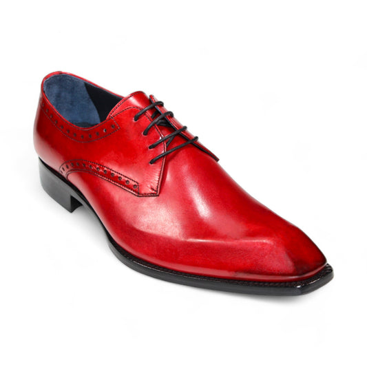 The Duca Di Matiste Arpino (Red) shoes by Duca Di Matiste are elegant red leather dress shoes with black laces and decorative stitching. They feature a pointed toe and a low black heel. These genuine leather shoes are crafted in Italy.