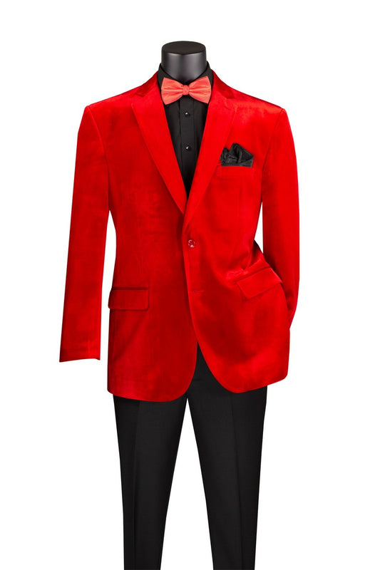 The Vinci Velvet Regular Fit Fashion Jacket (Red) B-27 by Vinci Suits, with its classic notch lapel, elegantly pairs with a black shirt, red bow tie, and pocket square. Displayed on a mannequin with black pants, this ensemble delivers a sophisticated regular-fit silhouette.