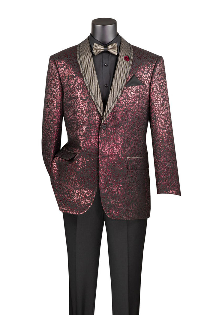 A mannequin is styled in the Vinci Regular Fit Jacket with Dots Lapel and Matching Bow Tie Burgundy BF-6 by Vinci Suits, featuring a metallic red and black pattern, complete with a wide shawl lapel. The look is elegantly finished with a gray matching bow tie and black shirt.