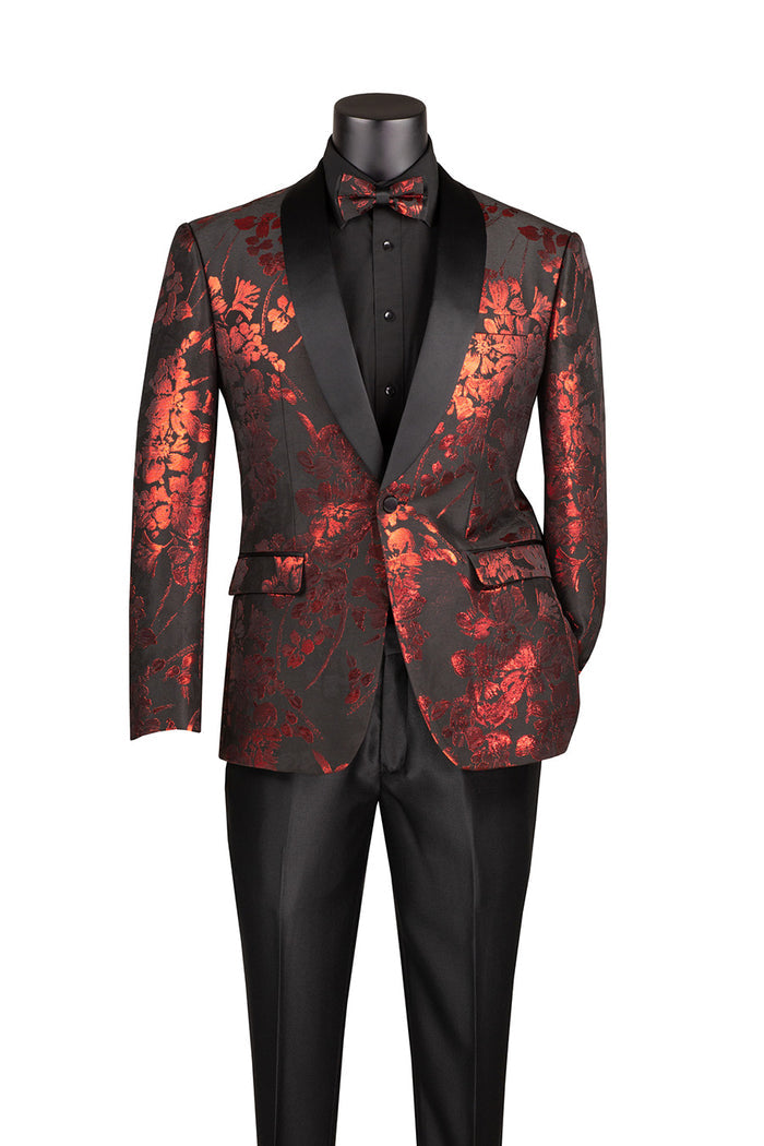 The mannequin is adorned with the Vinci Slim Fit Fashion Jacket Shawl Lapel with Bow Tie Red BSF-19 from Vinci Suits, showcasing an intricate black and red floral pattern. This slim fit blazer, paired with a coordinating bow tie, exudes elegance. The single-breasted design combines style with practicality, offering wrinkle resistance for a consistently sharp appearance throughout the day.