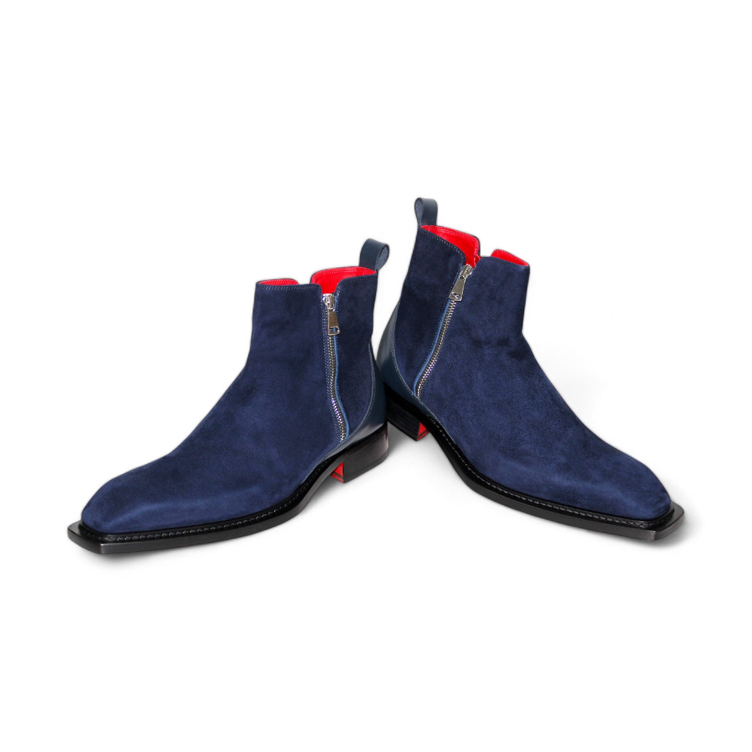 Introducing the Emilio Franco "Cesare" Navy Boot, expertly crafted in Italy – a stylish ankle boot with a bold red leather interior and convenient zipper closure, all beautifully showcased on a pristine white background.