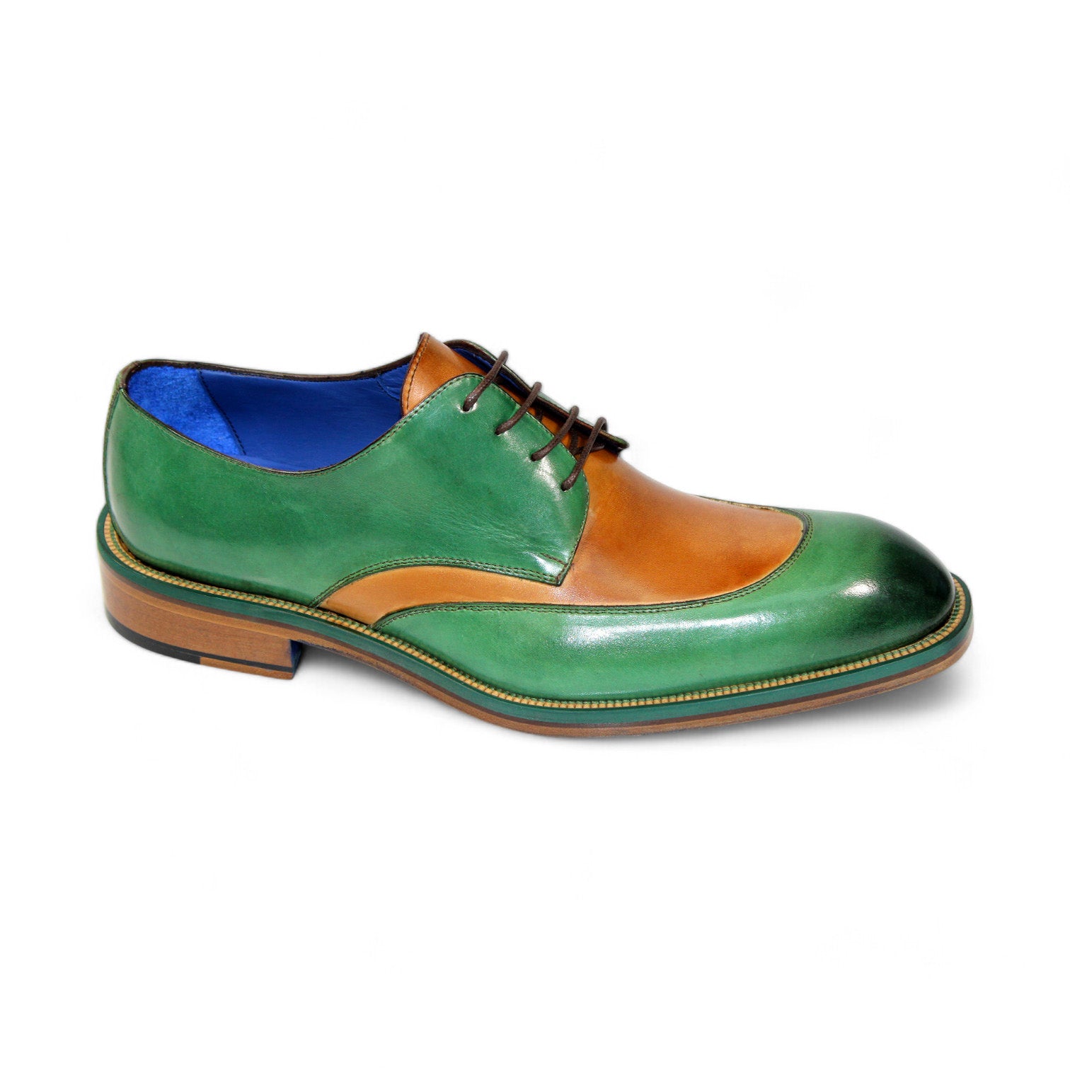 The Emilio Franco "Cosimo" Green/Cognac Shoes, crafted with precision in Italy, feature a blue lining and brown laces, elegantly perched on a wooden sole.