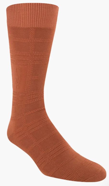 The Stacy Adams Tonal Plaid Cognac Dress Sock by ORIGINS is a stylish, brown sock featuring a subtle plaid design, elegantly showcased on a plain white background. It fits men's sizes 8-13 perfectly.