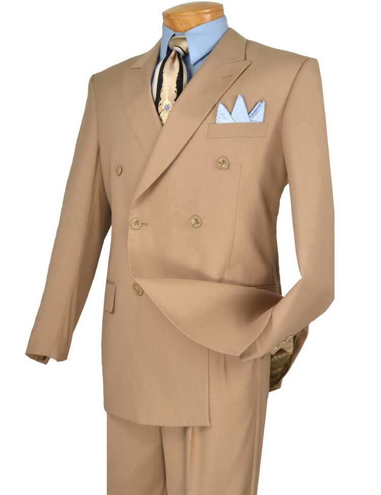 A beige Vinci Suits regular fit double-breasted, two-piece suit with a flexible elastic waistband (Beige F-DC900), paired with a light blue shirt, patterned tie, and matching pocket square is elegantly displayed on a mannequin, featuring wrinkle-resistant fabric for effortless sophistication.