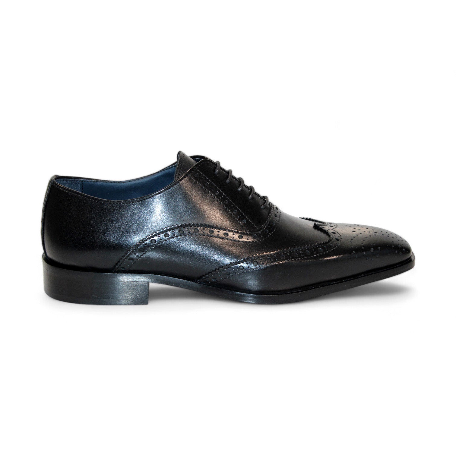 The Firmani Donald Black Shoes offer a sophisticated leather dress shoe featuring brogue detailing and a lace-up design, expertly crafted in Italy.