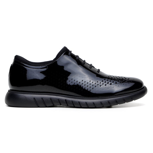 Presenting the Belvedere Maxim, a black laser-cut wingtip sneaker by BELVEDERE. Crafted from luxurious Nappa leather, these sneakers feature a glossy finish with a textured design and robust soles. Enjoy the added comfort of a foam-cushioned insole in this hybrid shoe that blends classic penny loafer style with modern flair.