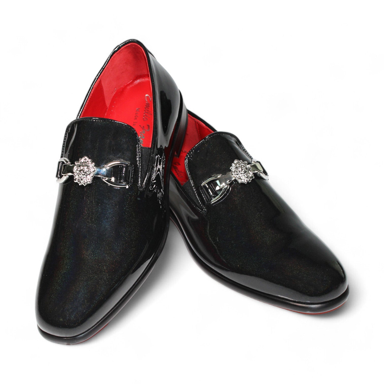 The Emilio Franco Couture "EF363Lion" black shoes are elegant leather loafers featuring a decorative metal buckle and a luxurious red interior lining. Handcrafted in Italy, they blend classic style with modern flair.