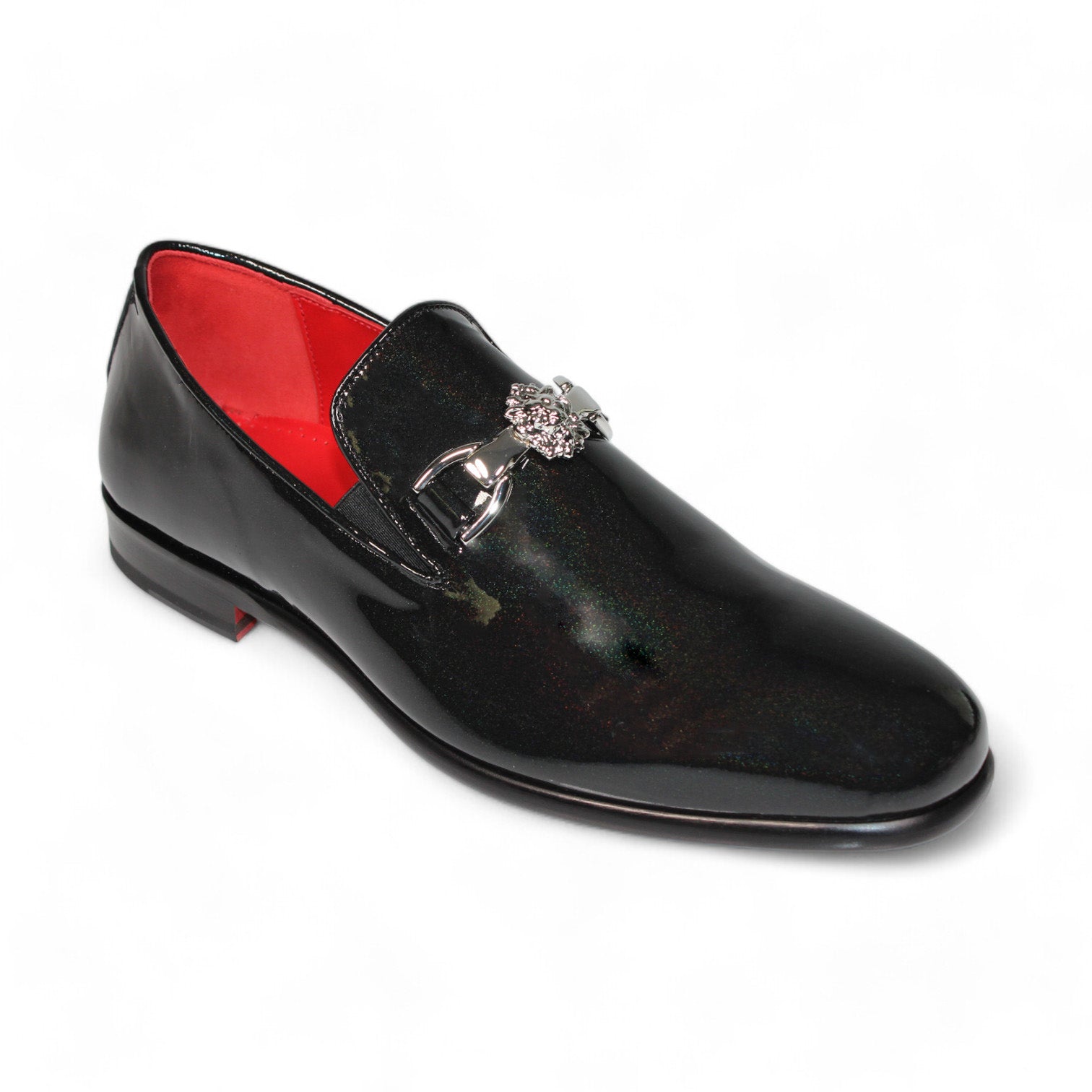 The Emilio Franco Couture "EF363Lion" black shoes are elegant leather loafers featuring a decorative metal buckle and a luxurious red interior lining. Handcrafted in Italy, they blend classic style with modern flair.