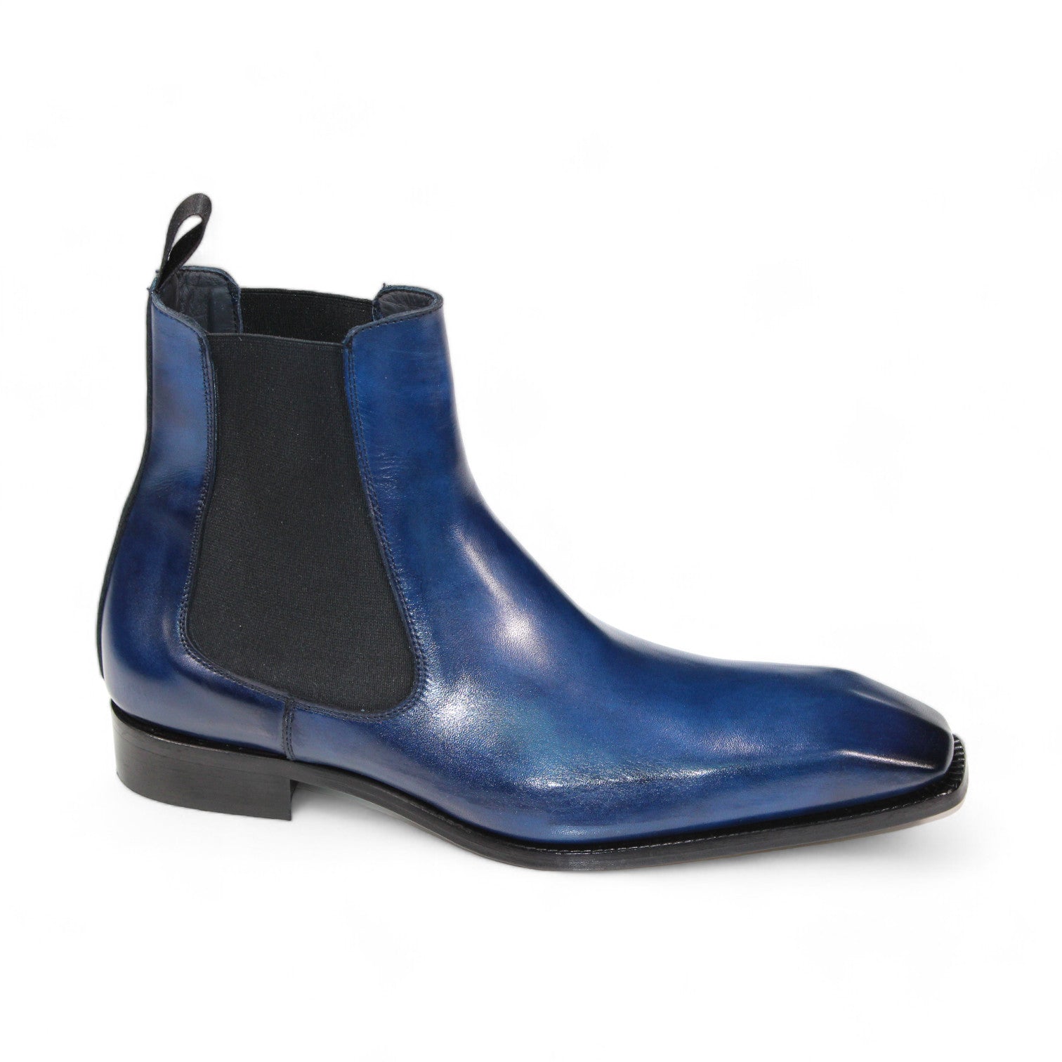 The Duca Di Matiste Empoli (Blue), a single Chelsea boot crafted from genuine Italian leather, showcases a black elastic side panel and a low heel, all set against a plain white background.