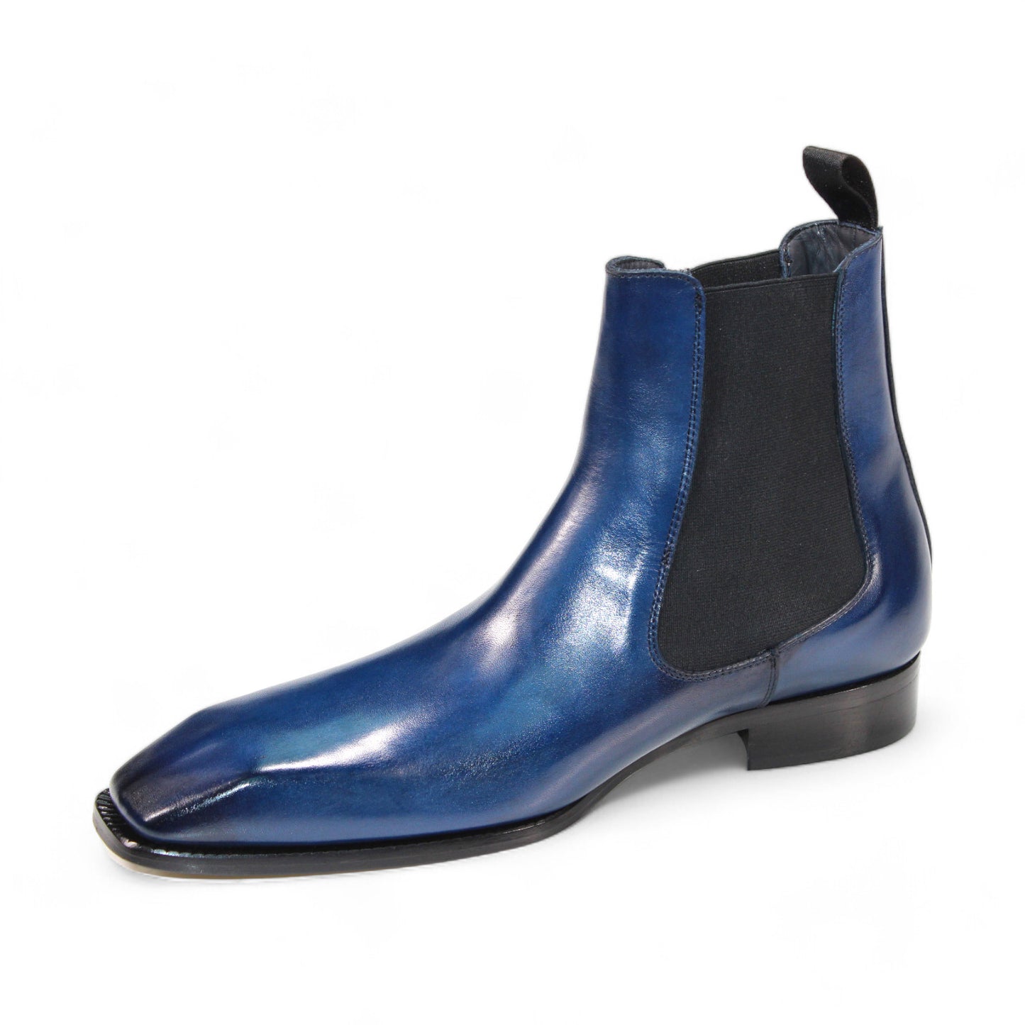 The Duca Di Matiste Empoli (Blue), a single Chelsea boot crafted from genuine Italian leather, showcases a black elastic side panel and a low heel, all set against a plain white background.