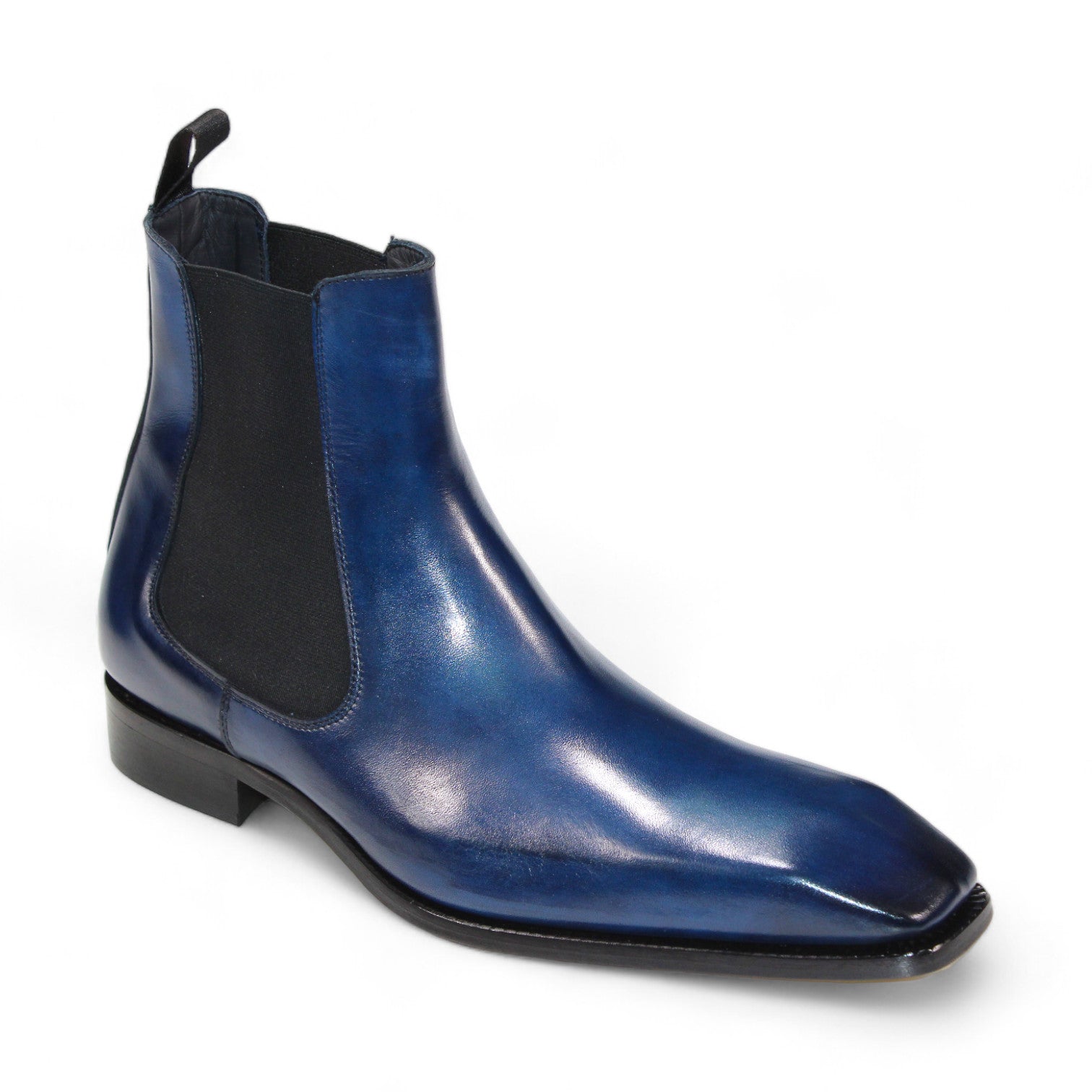 The Duca Di Matiste Empoli (Blue), a single Chelsea boot crafted from genuine Italian leather, showcases a black elastic side panel and a low heel, all set against a plain white background.