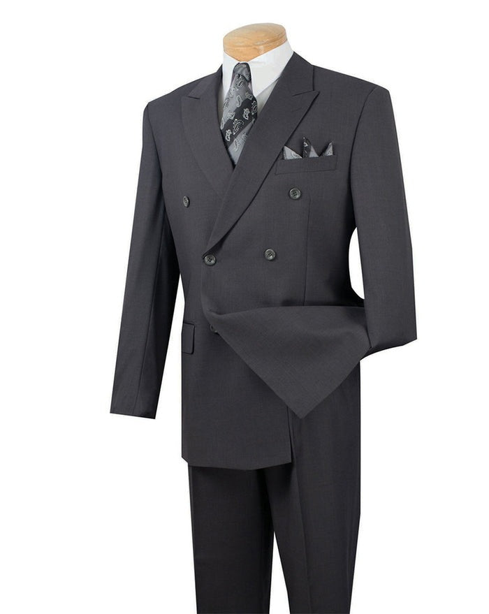 A wrinkle-resistant heather gray double-breasted suit from Vinci Suits with a patterned tie and pocket square on a stand.