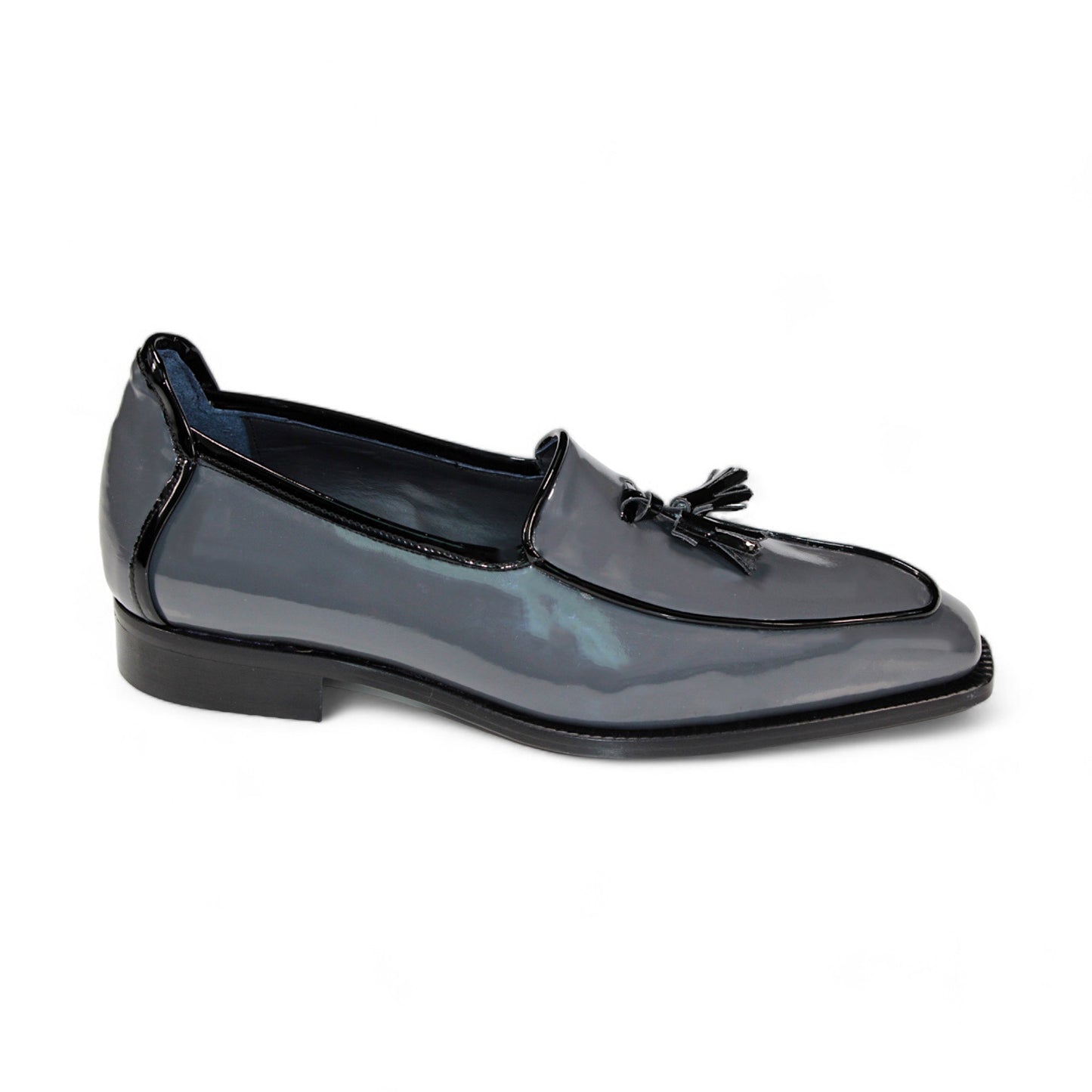 Duca Di Matiste Fano loafer in glossy black patent leather with a tassel detail, slight heel, and side view, crafted in Italy.