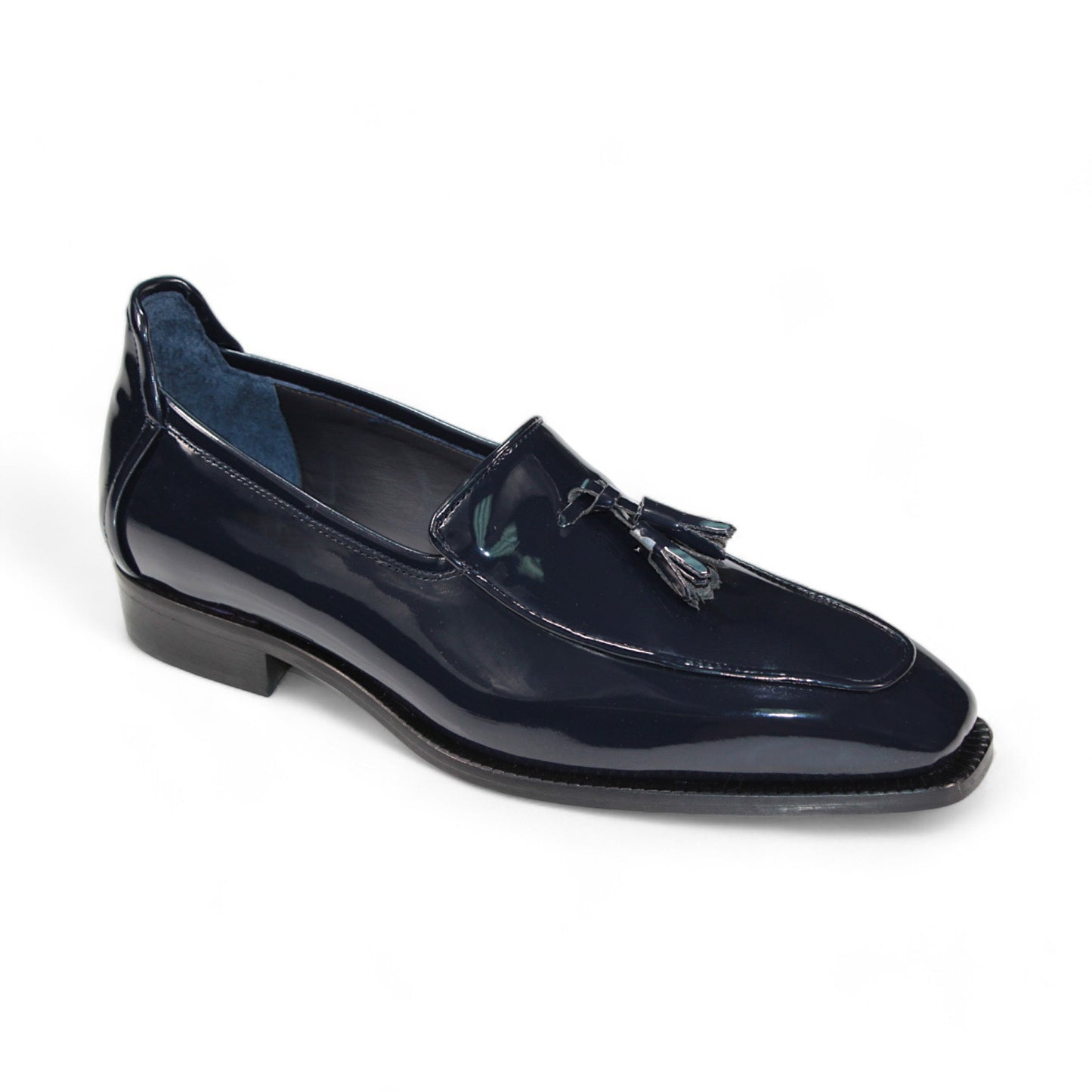 A single Duca Di Matiste Fano loafer in navy, expertly crafted with a tassel detail, displayed from the side against a white background. Made in Italy by Duca Di Matiste, it showcases exceptional craftsmanship and premium materials.