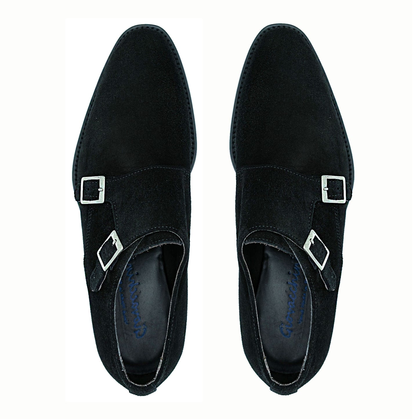 The GIOVACCHINI Francesco Black Suede Shoes, crafted in Italy by GIOVACCHINI, showcase two gleaming silver buckles and exude timeless elegance from the side view.