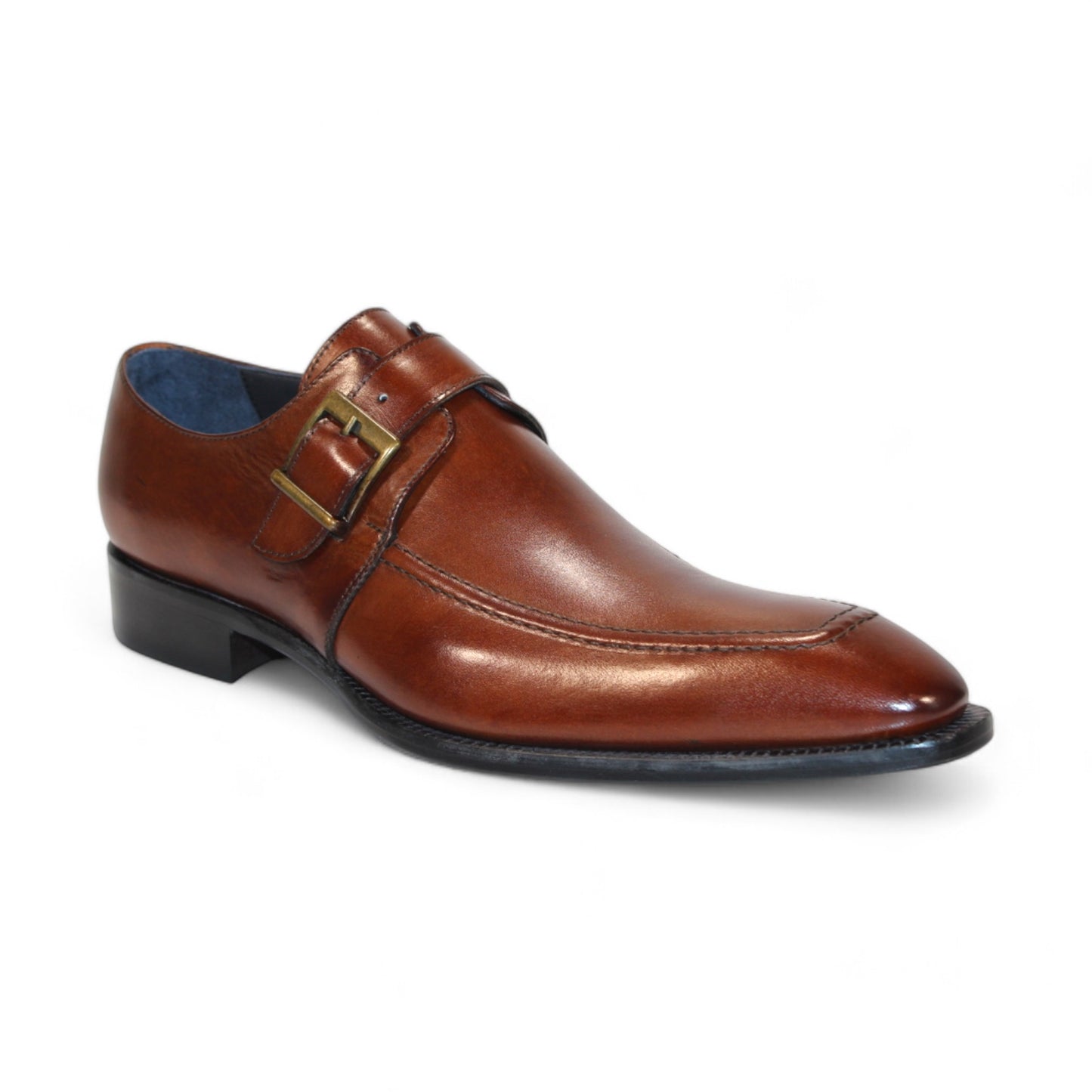 Introducing the Duca Di Matiste Garda (Brown), a sophisticated monk strap shoe made from genuine Italian leather. It boasts a polished finish and a dark sole, all crafted by the esteemed brand Duca Di Matiste. This exquisite shoe is beautifully presented against a pristine white background, highlighting its elegance and craftsmanship.