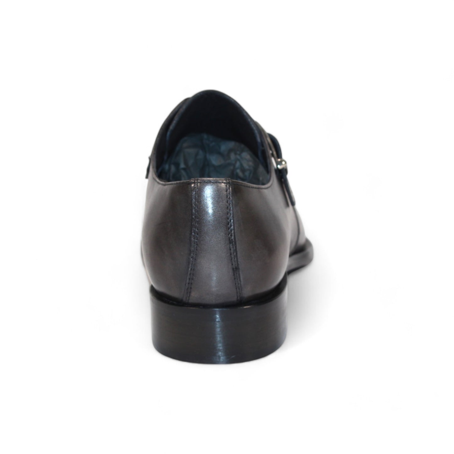 A sophisticated grey Italian leather dress shoe by Duca Di Matiste, featuring a buckle strap and a low heel, viewed from the side on a white background.