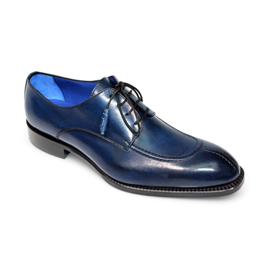 The Emilio Franco Artigiana "Girolamo" Navy Shoes are sophisticated, featuring a polished blue leather finish with black laces and a low heel. Crafted from premium materials and made in Italy, they offer an elegant side profile.