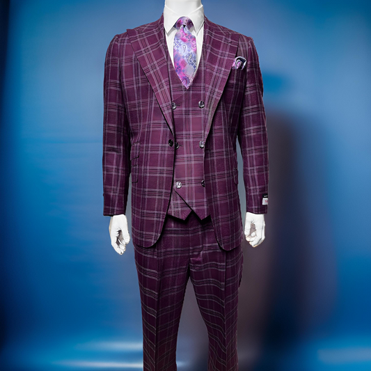 A mannequin dressed in the Tiglio Rosso Orvietto Burgundy / Grey TL6336, complemented by a floral tie and set against a blue background, elegantly captures the sophistication of Tiglio Rosso suits.