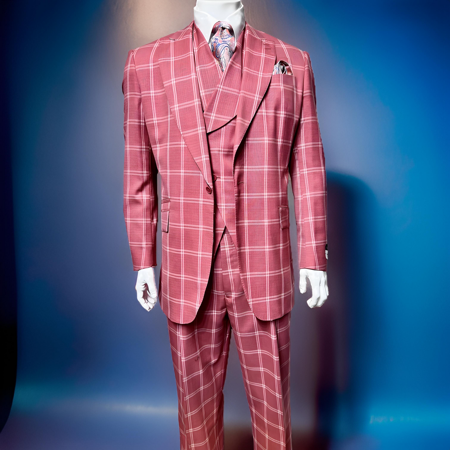 A Tiglio Rosso New Rosso Peach Wide Leg Pure Wool Suit/Vest (available in sizes 44L and 50R) is stylishly showcased on a mannequin against a blue background, highlighting the exquisite craftsmanship of Tiglio Rosso apparel.