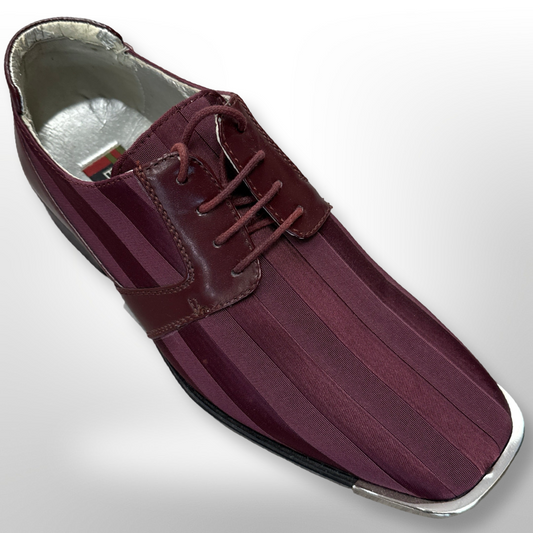 The Fiesso Shoe 82, featuring a maroon striped design with a square toe and brown laces, is perfect for making a statement on sale days. Available in sizes 8, 9, and 9.5 only as a final sale item.