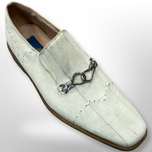 The Fiesso Shoe 33, available in sizes 7.5 and 8 only, features a white suede loafer design with decorative metal embellishment on top and a brown sole. It is offered as a final sale item with no returns or exchanges.