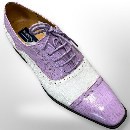 Introducing the Fiesso Shoe 33, a distinctive pointed-toe dress shoe crafted from purple and white crocodile-patterned leather and equipped with laces. Please note that this size 10 exclusive is a final sale item with no returns or exchanges available.