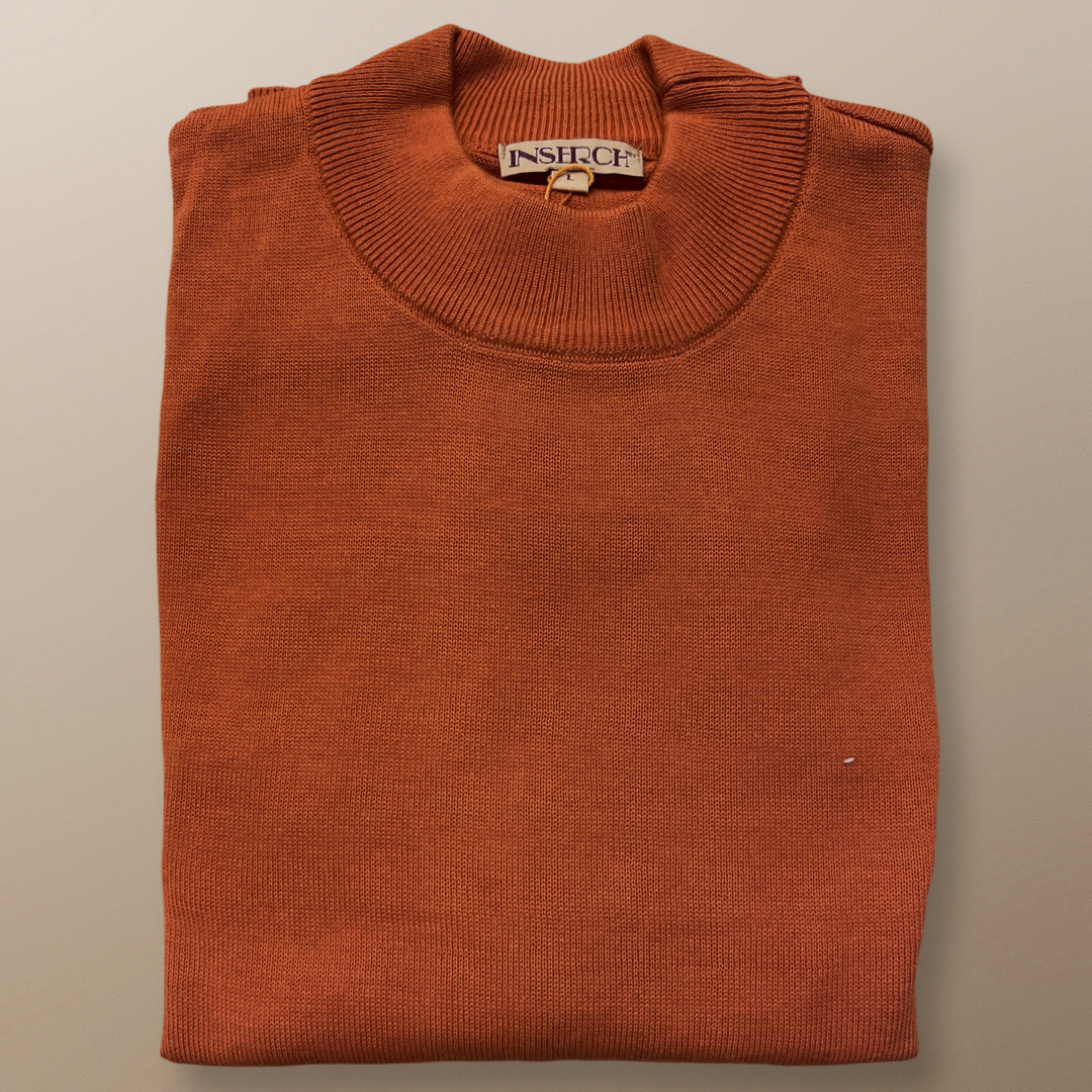 The Inserch Cotton Blend Mock Neck Sweater Orange 4308-00029, featuring a ribbed collar and crafted from a cotton blend, is gracefully displayed on a neutral background.