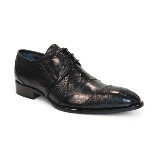 Duca Di Matiste's Imperio (Black) is a black leather dress shoe that showcases an embossed croco pattern and a textured, woven design. Featuring a lace-up closure on a dark heel, this shoe is crafted in Italy for exceptional quality and style.