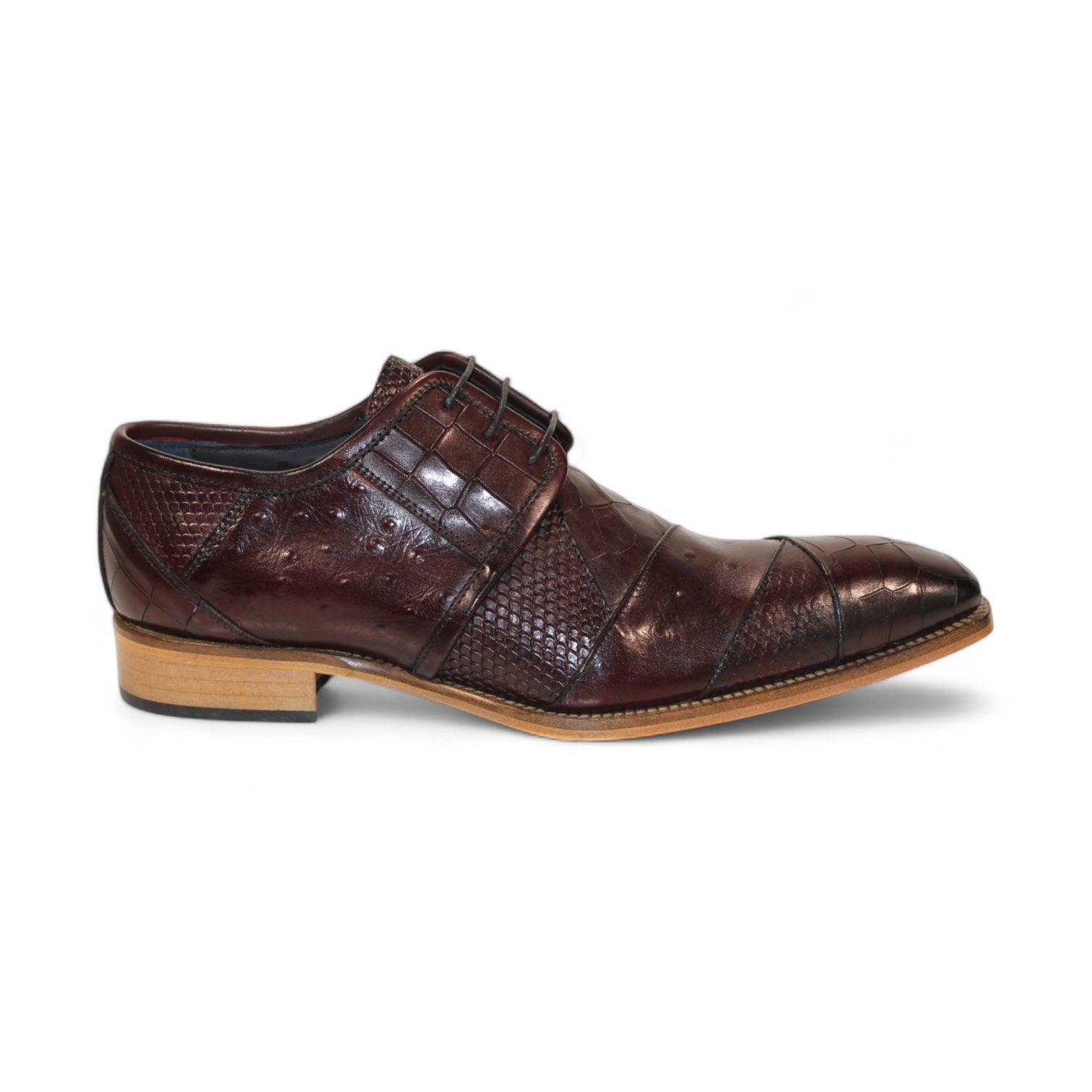 Duca Di Matiste's Imperio in burgundy, an Italian-crafted shoe, showcases a textured crocodile-like pattern and a refined wooden sole.