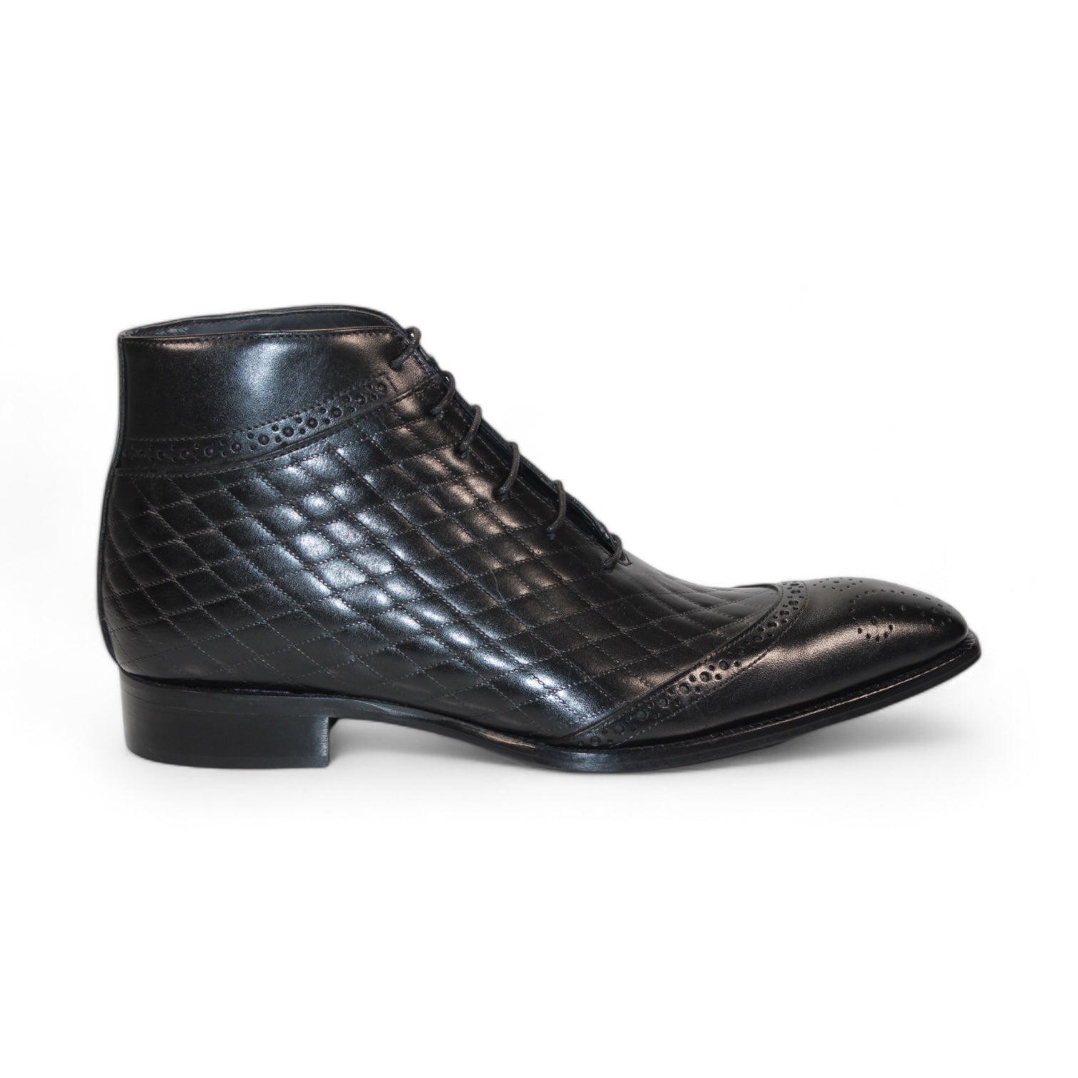 Introducing the Duca Di Matiste Lauro in black, a leather dress boot that showcases a quilted design and brogue detailing. Featuring an embossed croco texture for added sophistication, this Italian-made boot perfectly blends elegance with exquisite craftsmanship.