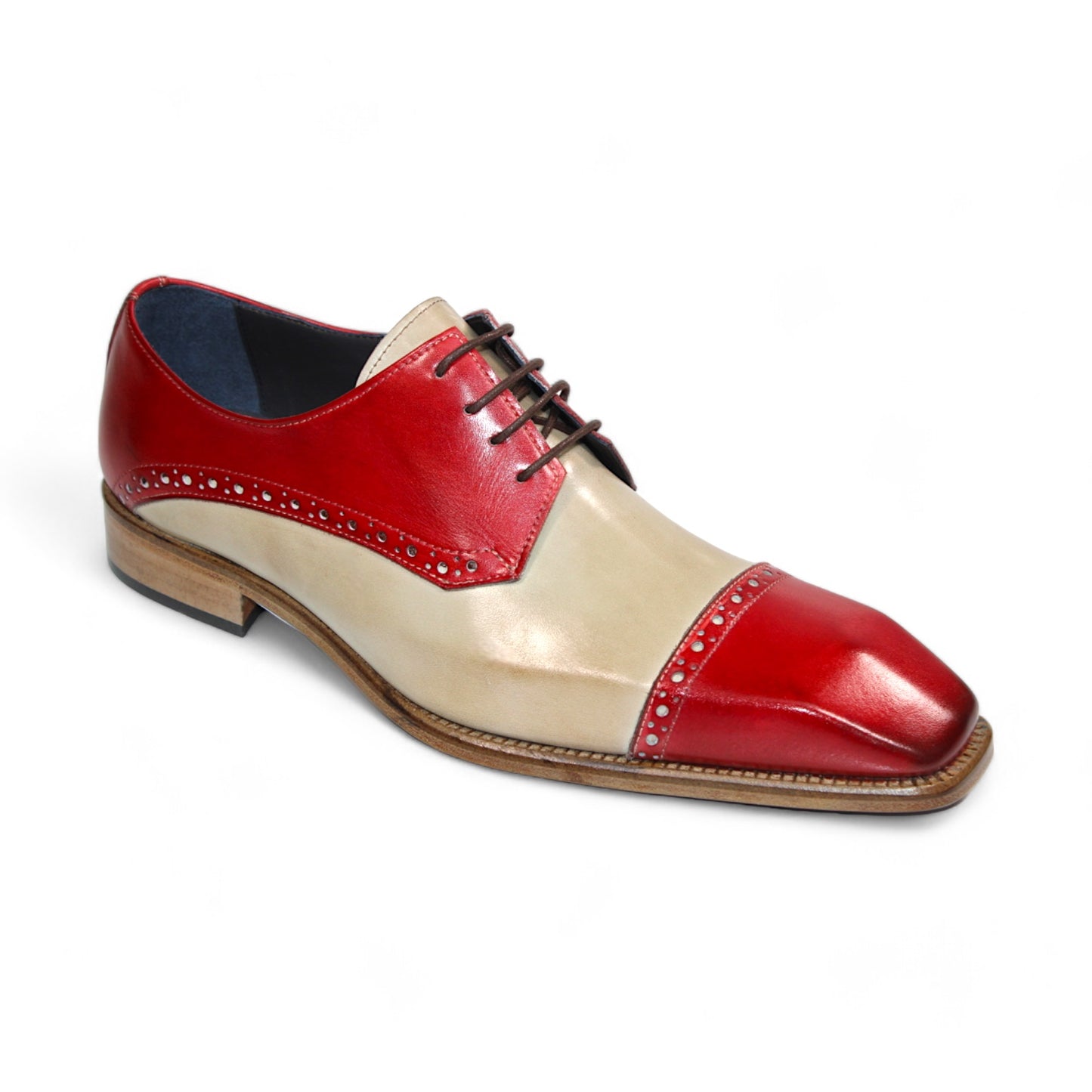 The Duca Di Matiste Lombardi is a men's dress shoe made in Italy, featuring red and beige leather with decorative perforations, a square toe, and a low wooden heel.